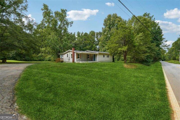 Property Photo:  309 Cowan Road SE  GA 30094 