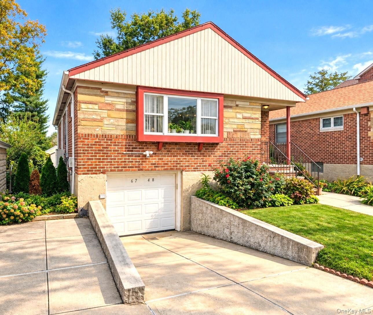 Property Photo:  67-48 168th Street  NY 11365 