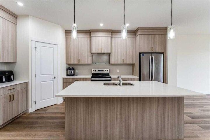 Property Photo:  3222 Chinook Winds Drive SW  AB T4B 0R7 