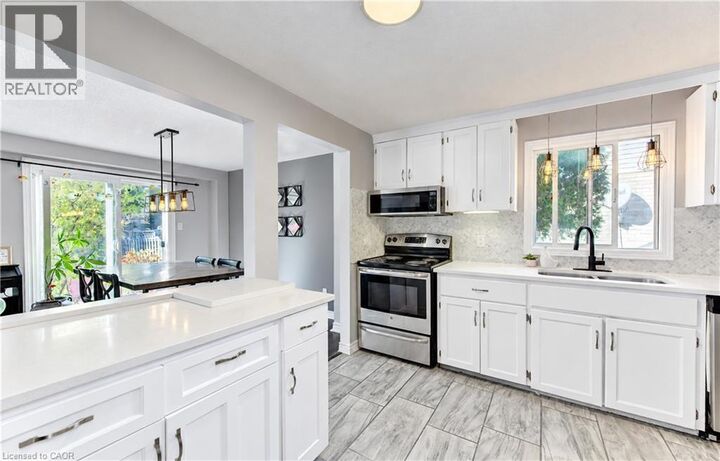 Property Photo:  527 Rosemeadow Crescent  ON N2T 1Z9 