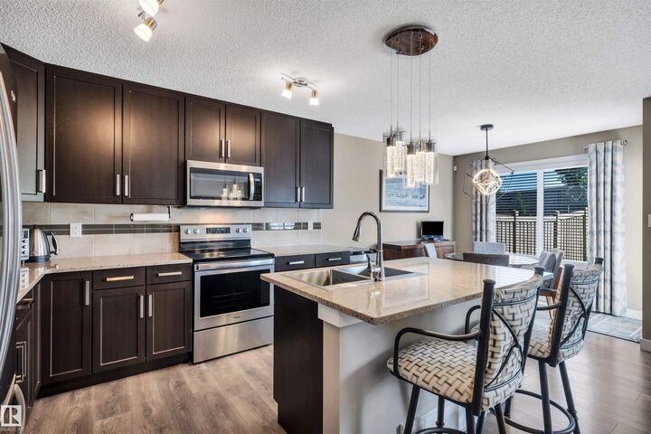 Property Photo:  5033 Andison Close SW  AB T6W 3T4 