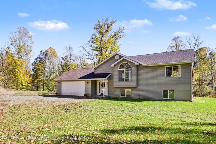 Property Photo:  10884 Wilderness Circle  MI 48890 