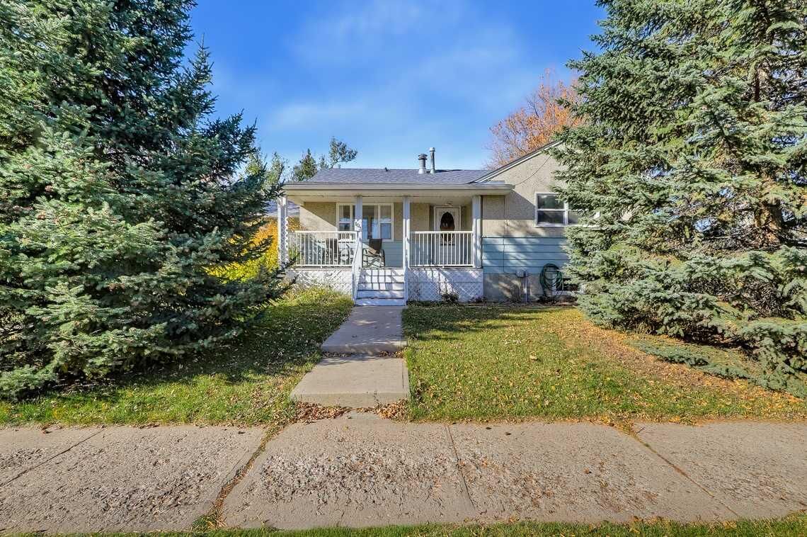 Property Photo:  103 2 Street SE  AB T1V 1G7 