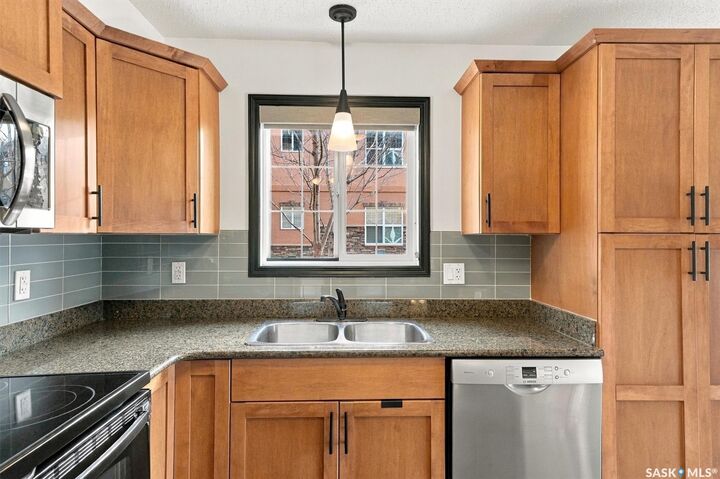 Property Photo:  103 Wellman Crescent A110  SK S7T 0C1 