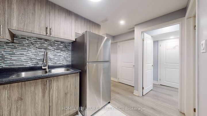 Property Photo:  50 Neelands Crescent Bsmt  ON M1E 0B6 