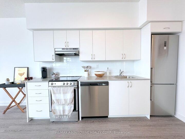 Property Photo:  25 Kitney Drive 208  ON L1S 4S4 