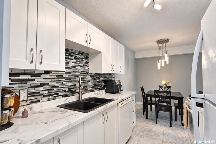 Property Photo:  1580 Olive Diefenbaker Drive 105  SK S6V 7M6 