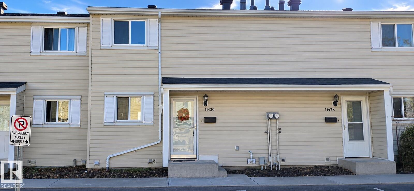 Property Photo:  11430 139 Avenue NW  AB T5X 3L4 