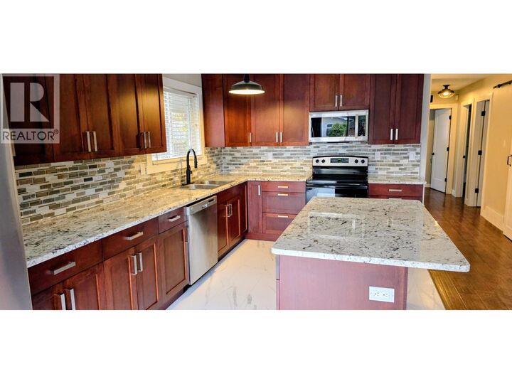 Property Photo:  4234 Punchaw Crescent  BC V2M 5E9 