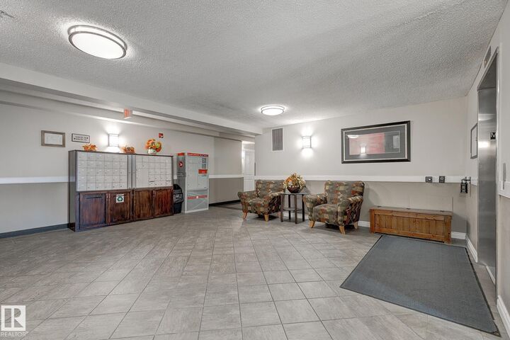 Property Photo:  6 Spruce Ridge Drive 208A  AB T7X 4M5 