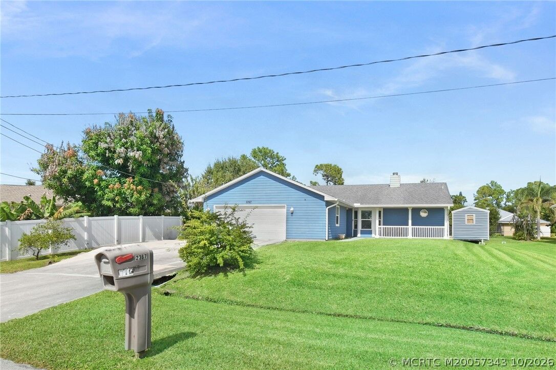 Property Photo:  2367 SW Madrid Road  FL 34953 
