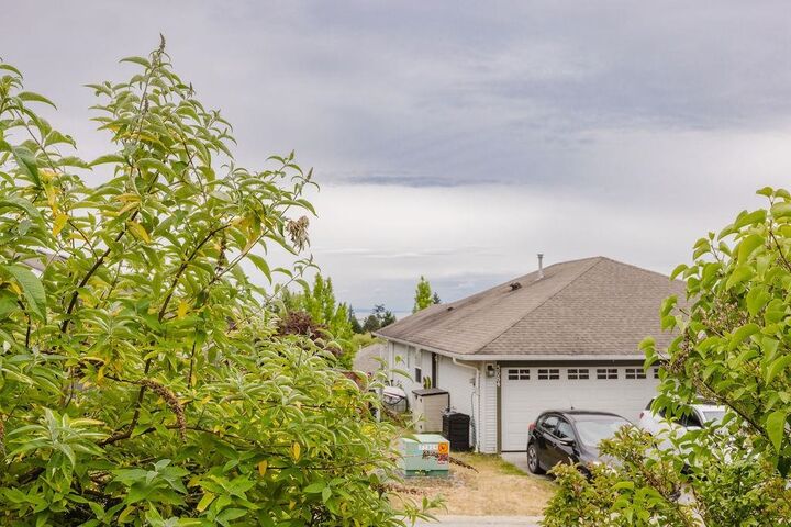 Property Photo:  5687 Emily Way  BC V7Z 0N5 