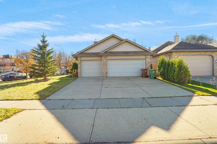 Property Photo:  2 Norris Crescent  AB T8N 7M1 