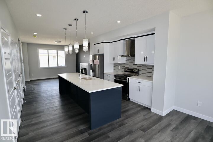 Property Photo:  284 Rolston Wynd Upper  AB T9E 1G5 