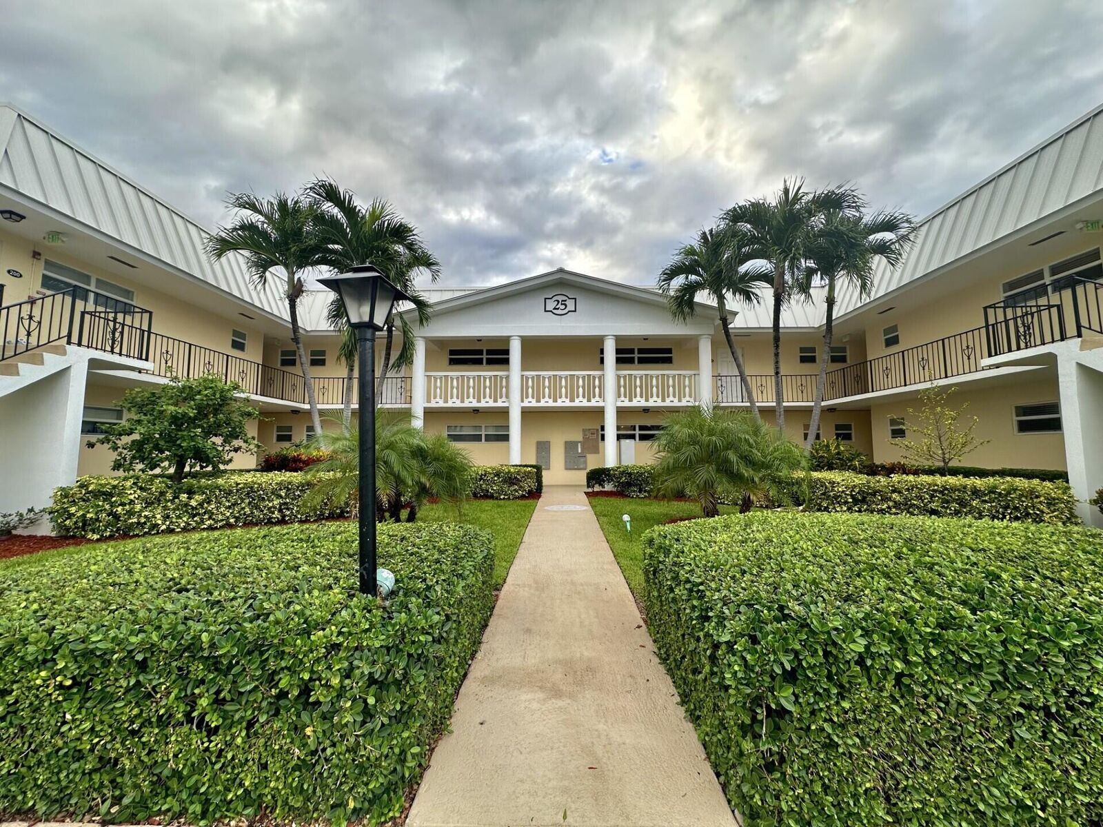 Property Photo:  25 Colonial Club Drive 103  FL 33435 