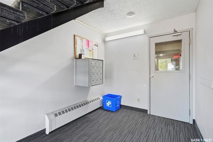 Property Photo:  345 Kingsmere Boulevard 202  SK S7J 4J6 