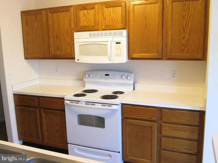 Property Photo: 695 Winding Stream Way #104 MD 21113