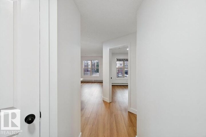 Property Photo: 11449 Ellerslie Road SW 209 AB T6W 1T2
