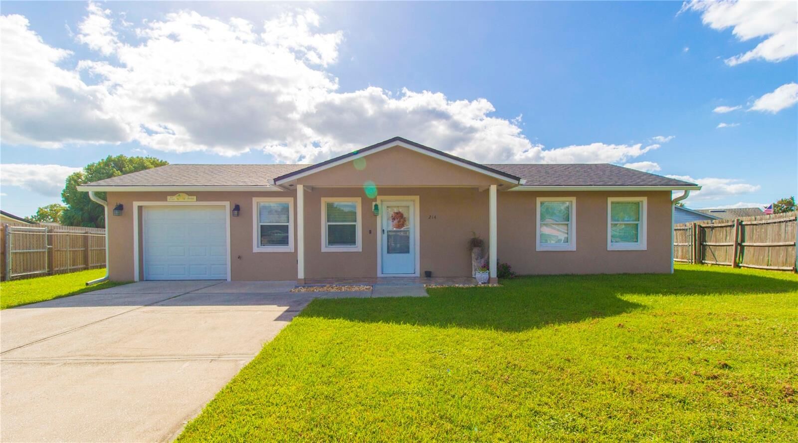 Property Photo:  214 Dahlia Drive  FL 34743 