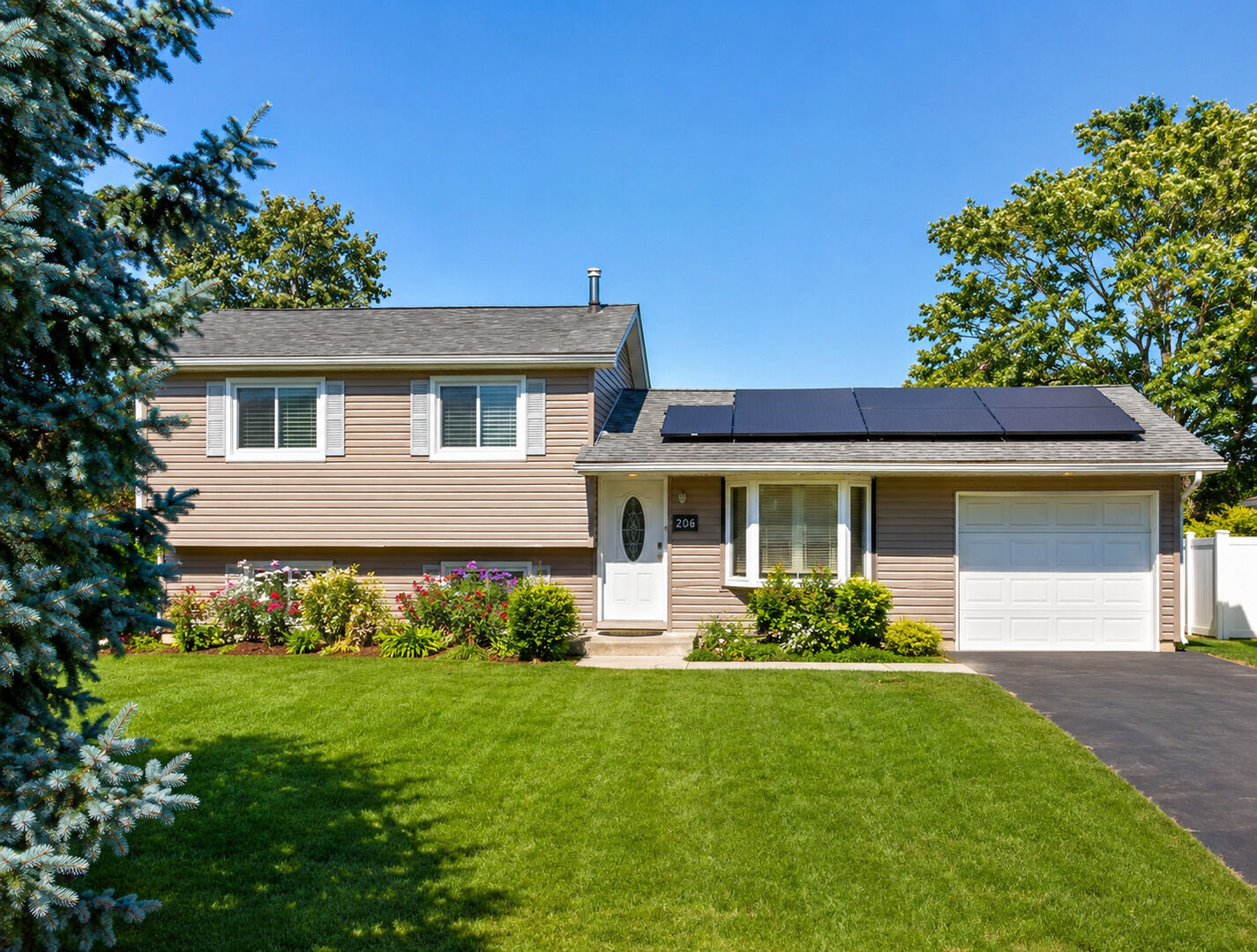 Property Photo: 206 E Briarcliff Road IL 60440
