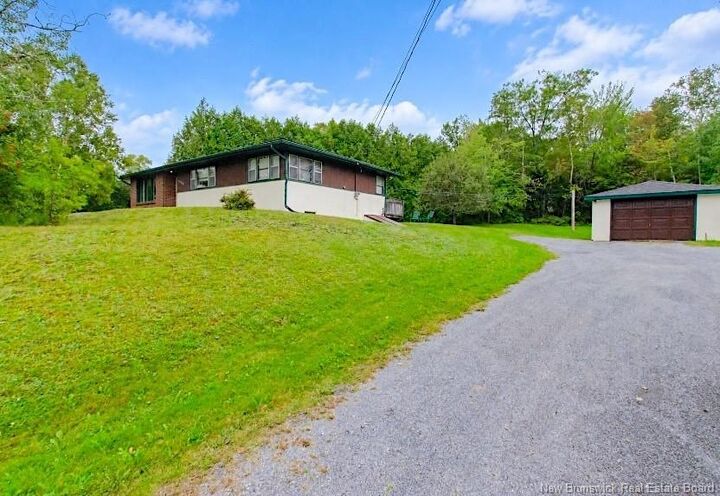 Property Photo:  1129 River Valley Drive  NB E5K 1B9 