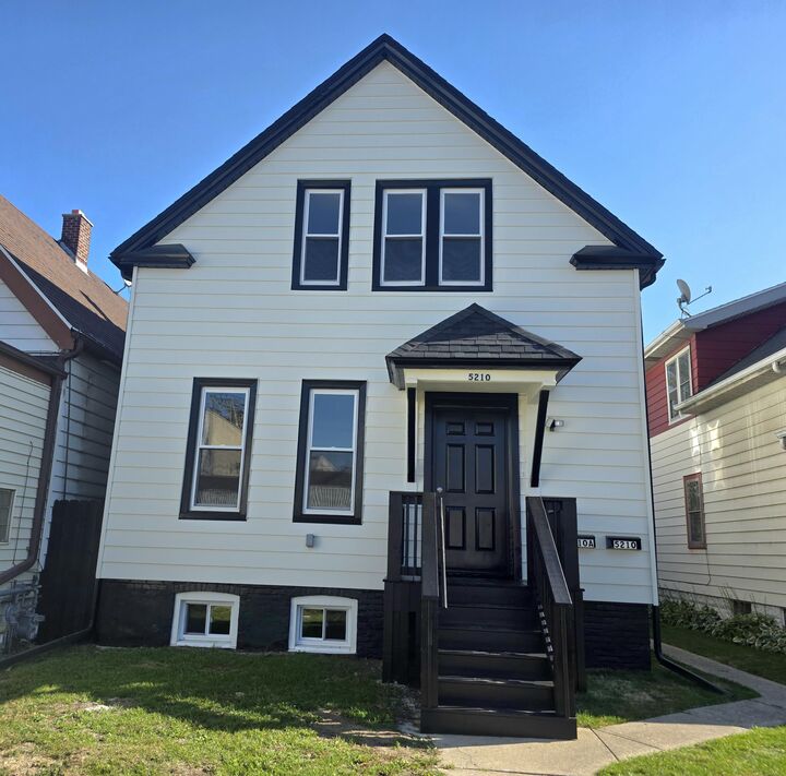 Property Photo:  5210 S Packard Ave  WI 53110 