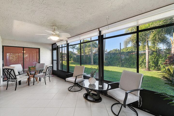 Property Photo:  10771 Palm Lake Avenue 102  FL 33437 