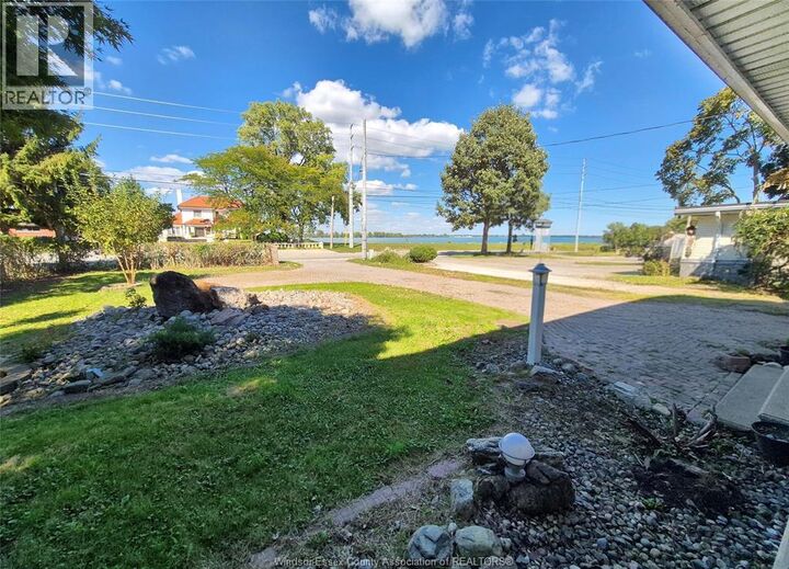 Property Photo:  6711 Riverside Drive East  ON N8S 1C1 