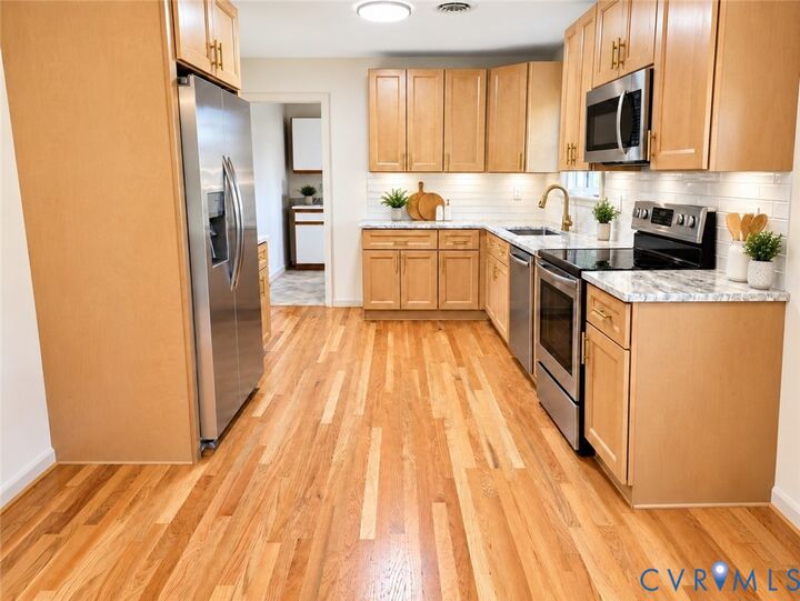 Property Photo: 7950 Kenmore Drive VA 23111