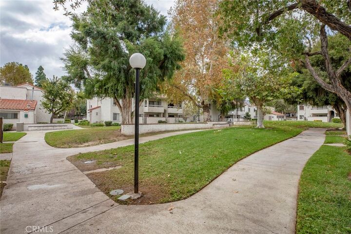 Property Photo:  25027 Peachland 260  CA 91321 