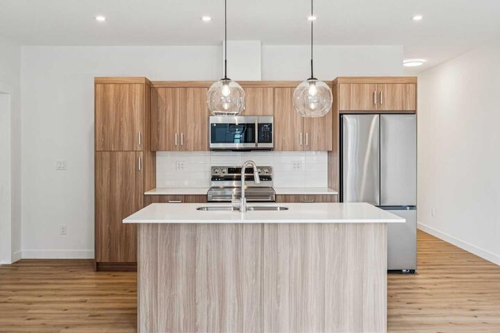 Property Photo: 3700 Seton Avenue SE 3207 AB T3M 4J1