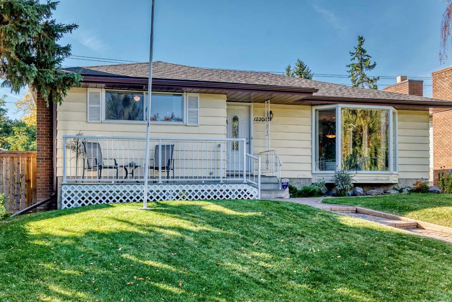 Property Photo:  12208 Canfield Road SW  AB T2W 1J9 