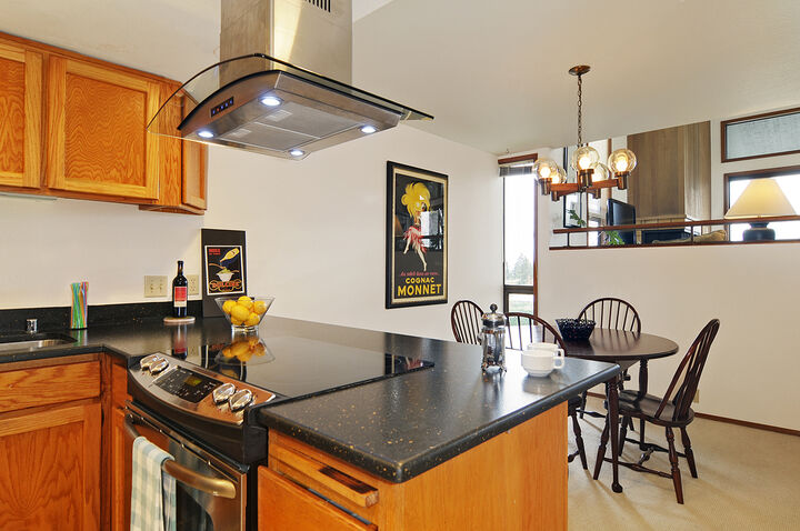 Property Photo: Kitchen, dining room, living room 11228 NE 68th E WA 98033
