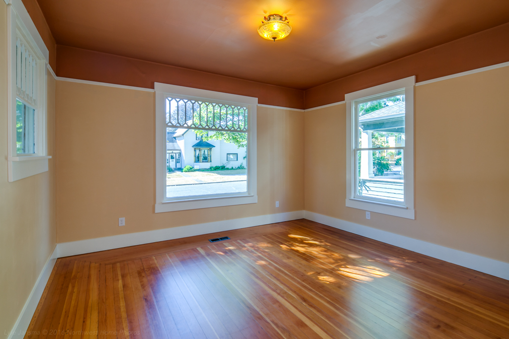 Property Photo: The living room is very spacious and has huge windows bringing in a lot of natural sunlight. the fir floors have all been refinished as well. 2220 Utter St  WA 98225 