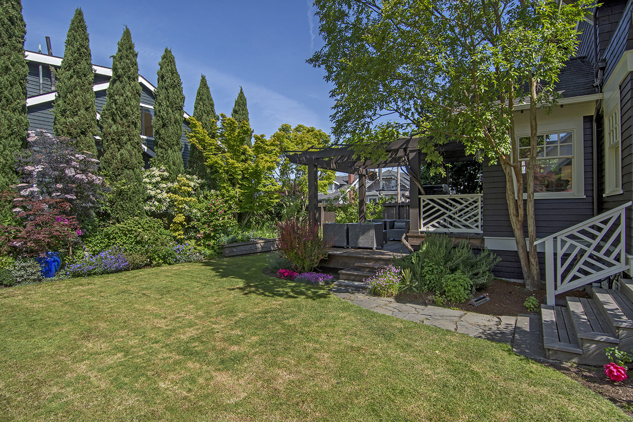 Property Photo: Backyard, Patio & Deck 1635 11th Ave W  WA 98119 