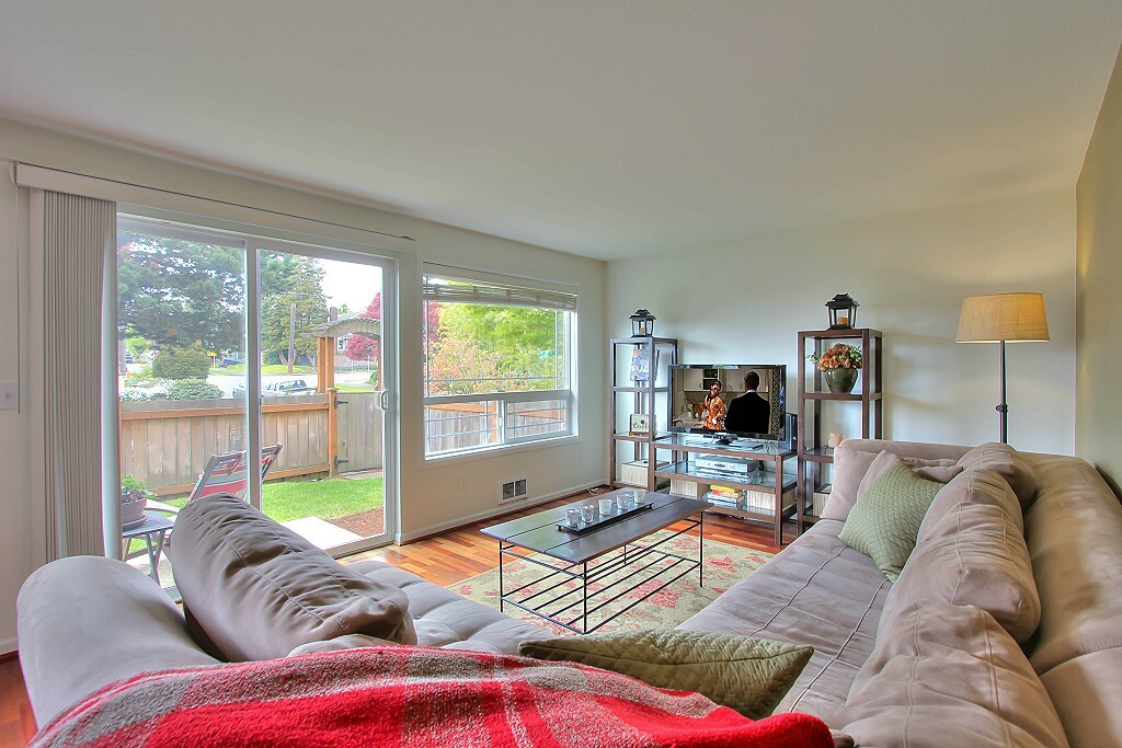 Property Photo: Living area and yard 717 NW 70th St 104  WA 98117 